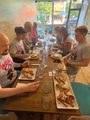 The team eating breakfast