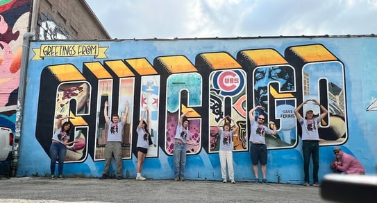 The ND team standing in front of "chicago" mural